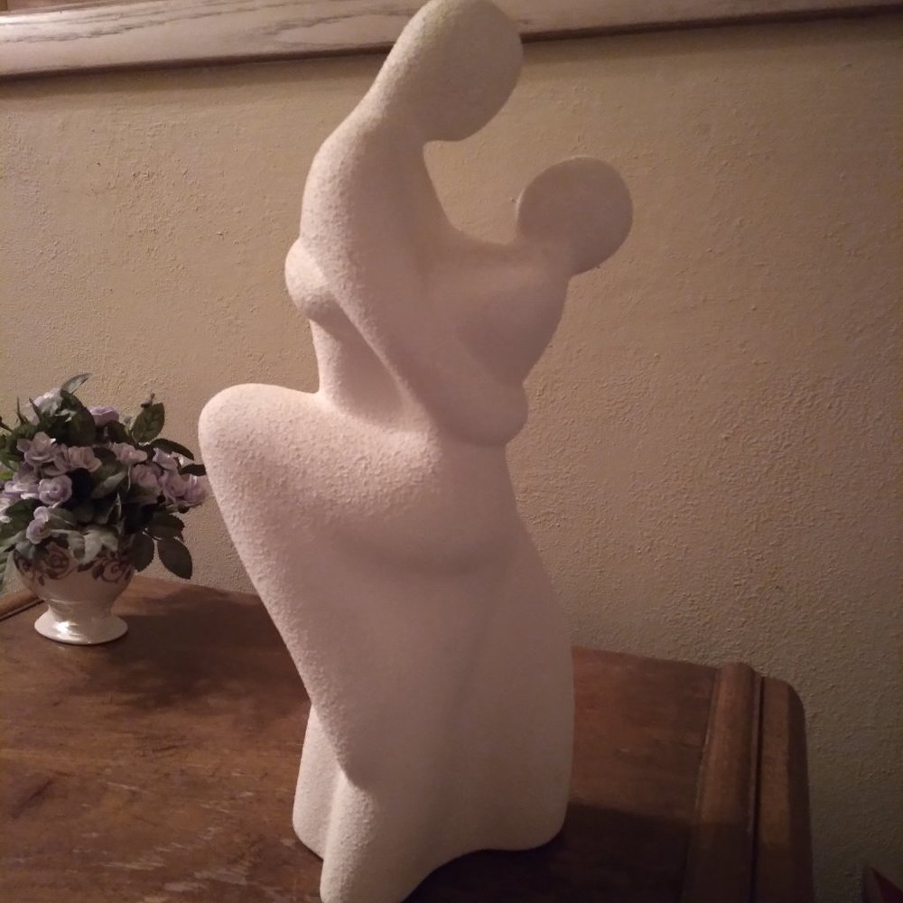 JC Penny stone dancer statue